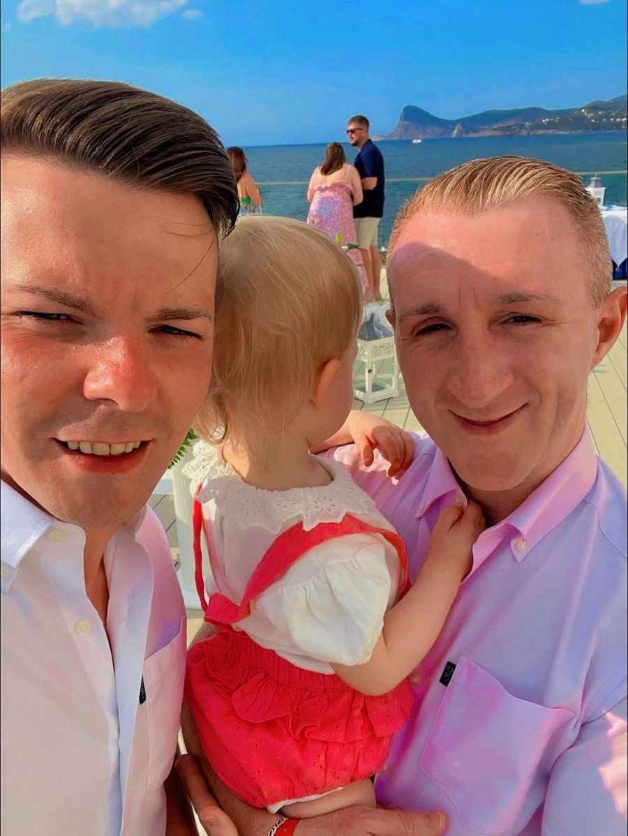 Gavin and Daniel McNamara-Jones and their daughter on holiday.jpg