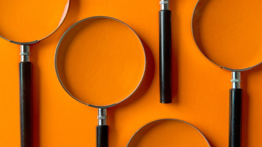 Orange magnifying glass.png